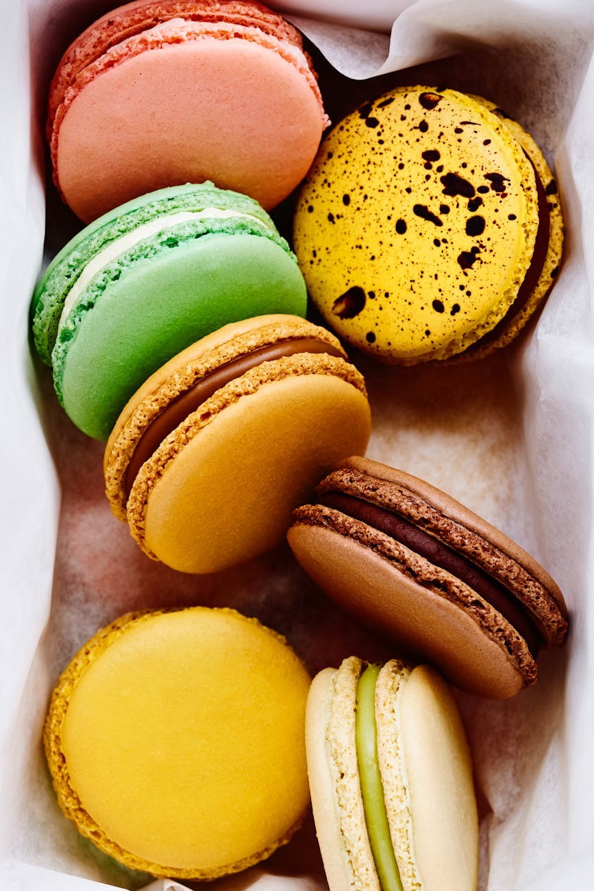 Festive pastry box arrangement with seasonal props and background
